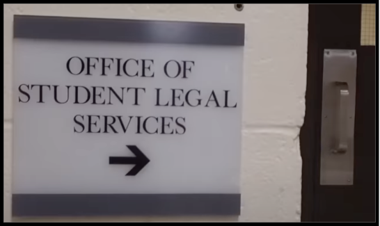 Image of Office of Student Legal Services sign inside the building.